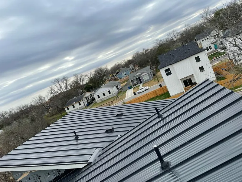 Standing seam metal roof panels with vents for Skylight Repair in Wilmore